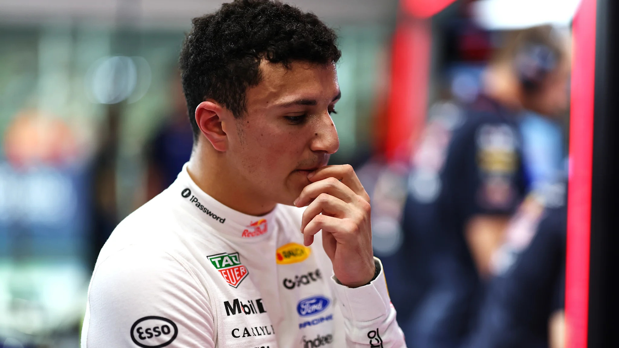 Isack Hadjar says he was “happy with the overall pace” after recovering to P10 from pit lane in Singapore
