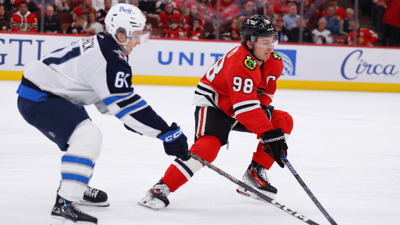 Blackhawks edge Jets in overtime as Bedard scores first goal of season