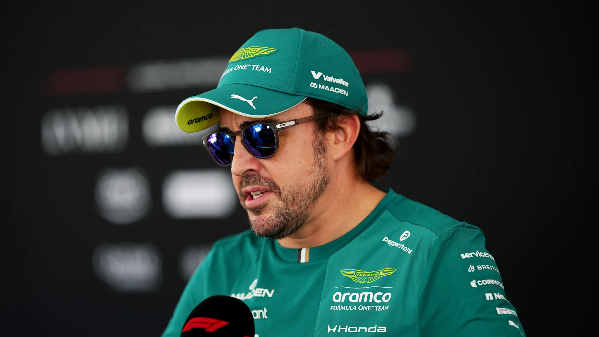 Fernando Alonso and Aston Martin seize a rain-altered moment in Sepang as Alonso takes P8