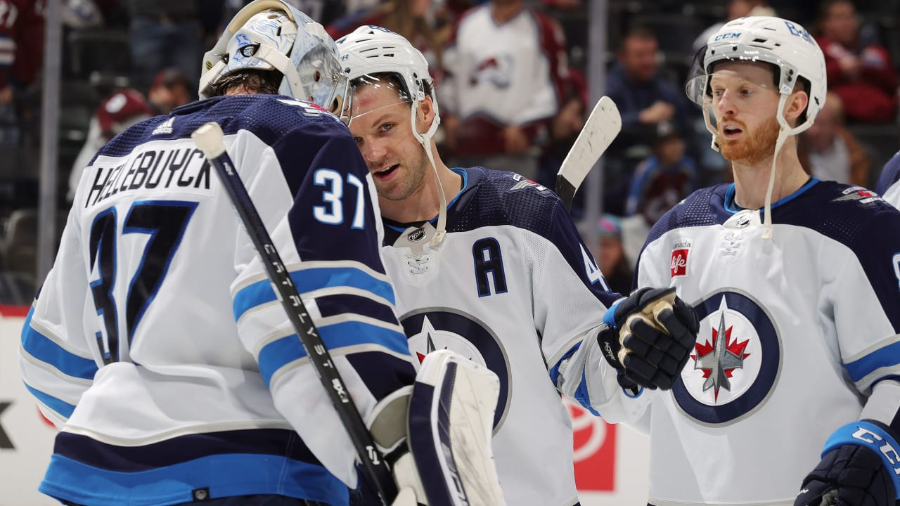 Winnipeg Jets open camp without Connor Hellebuyck as team keeps contract goalie in limbo
