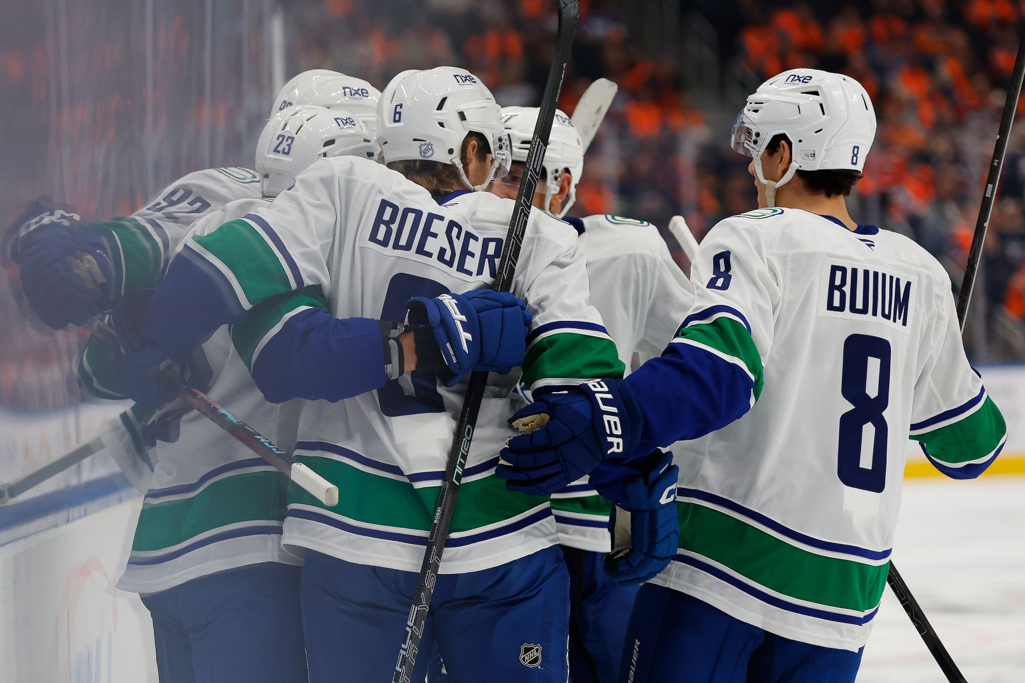 Canucks down Oilers 6-5 in OT as fans celebrate Cotter’s two goals