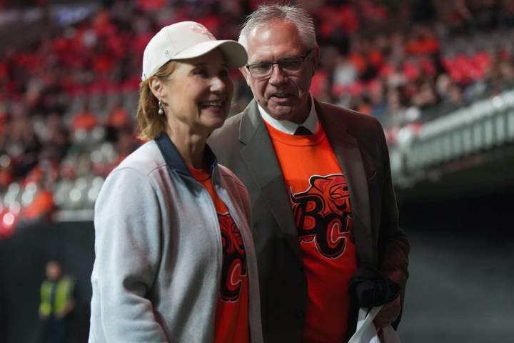 Lorne Doerkson and Christy Clark spotted at B.C. Lions vs. Roughriders game in Vancouver