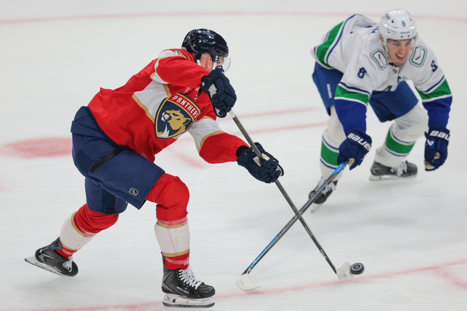 Brady Tkachuk scores twice in regulation and wins in overtime as Canucks fall 3–2 to Panthers