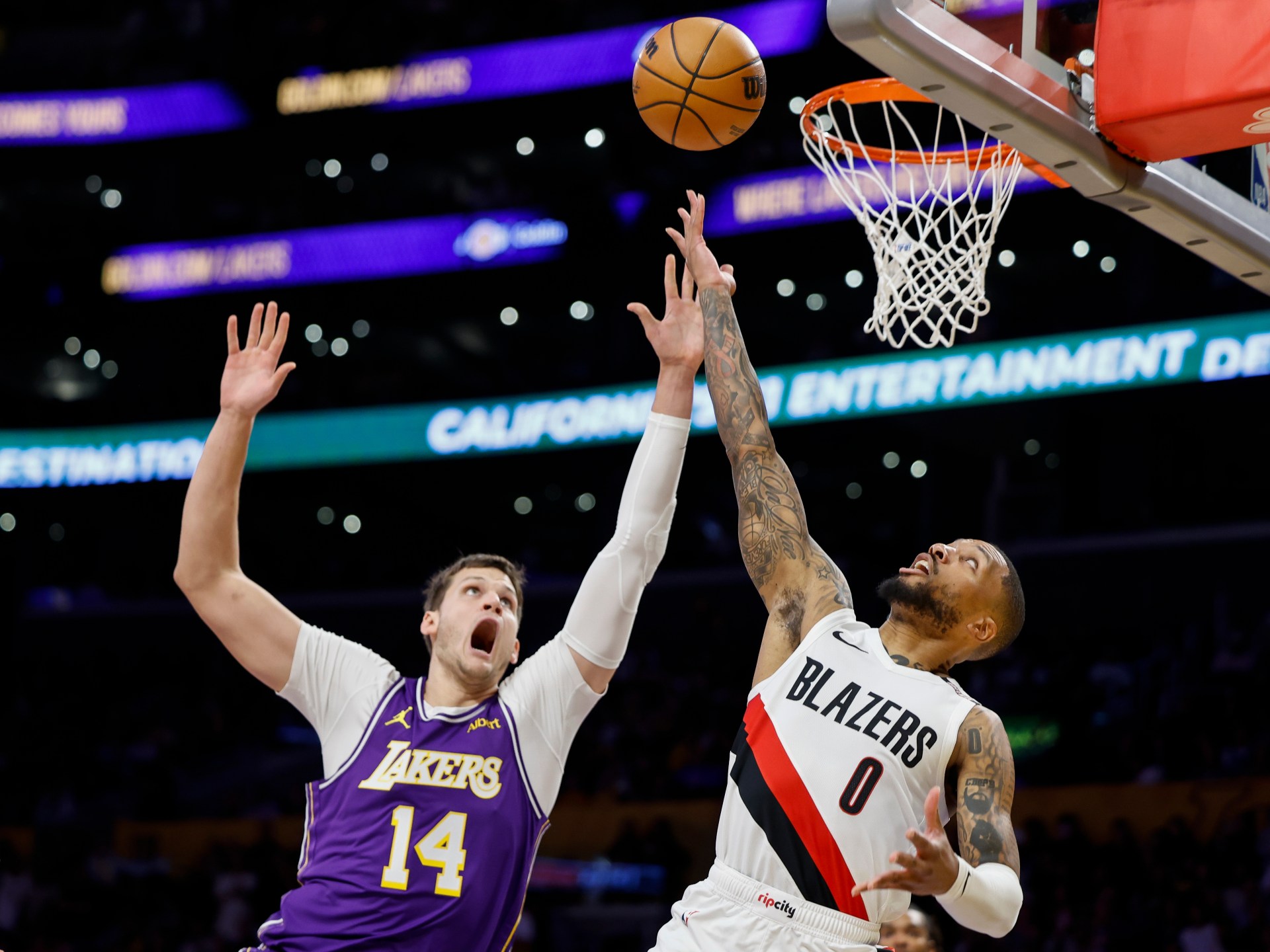 Deni Avdija and Ja Morant help Portland beat the Lakers 136-129 in battle of unbeaten teams