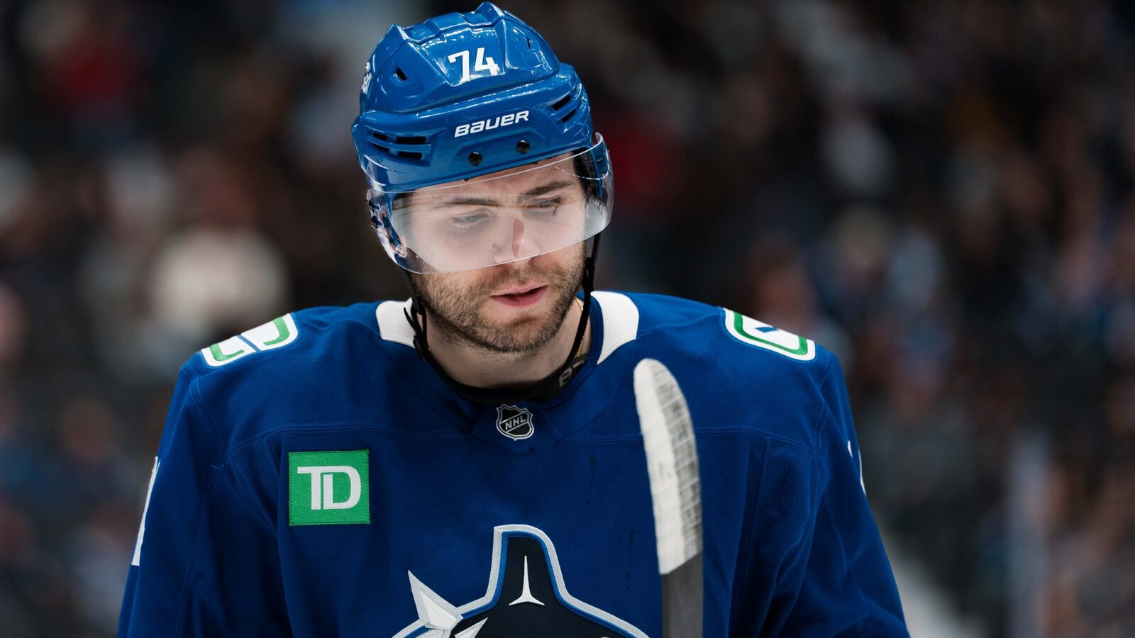 Canucks’ Jake DeBrusk out vs. Flames after becoming ill at Rogers Arena
