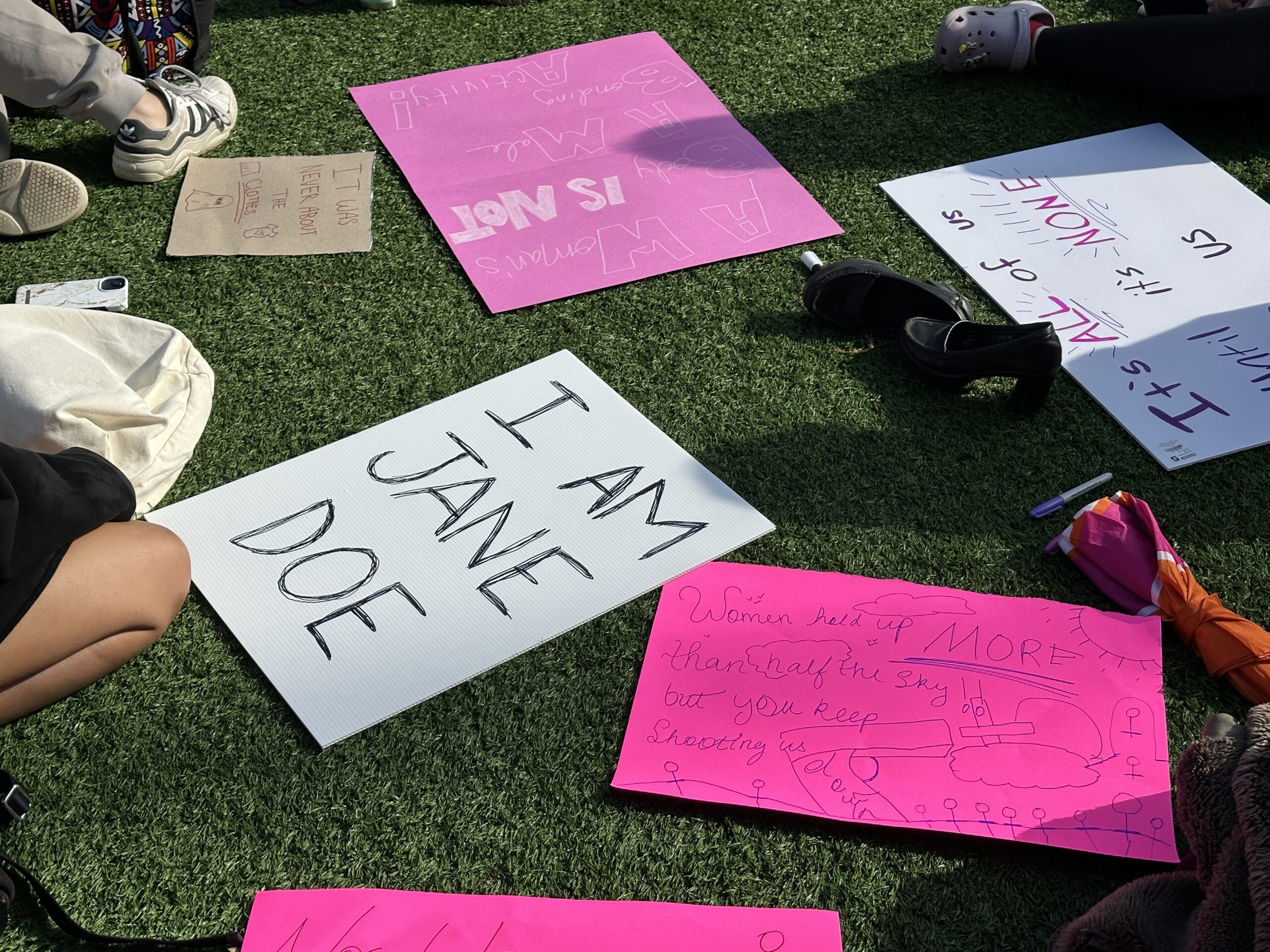 UBC students march with “We Are Jane Doe” signs, calling for stronger support and accountability after Cornell suit