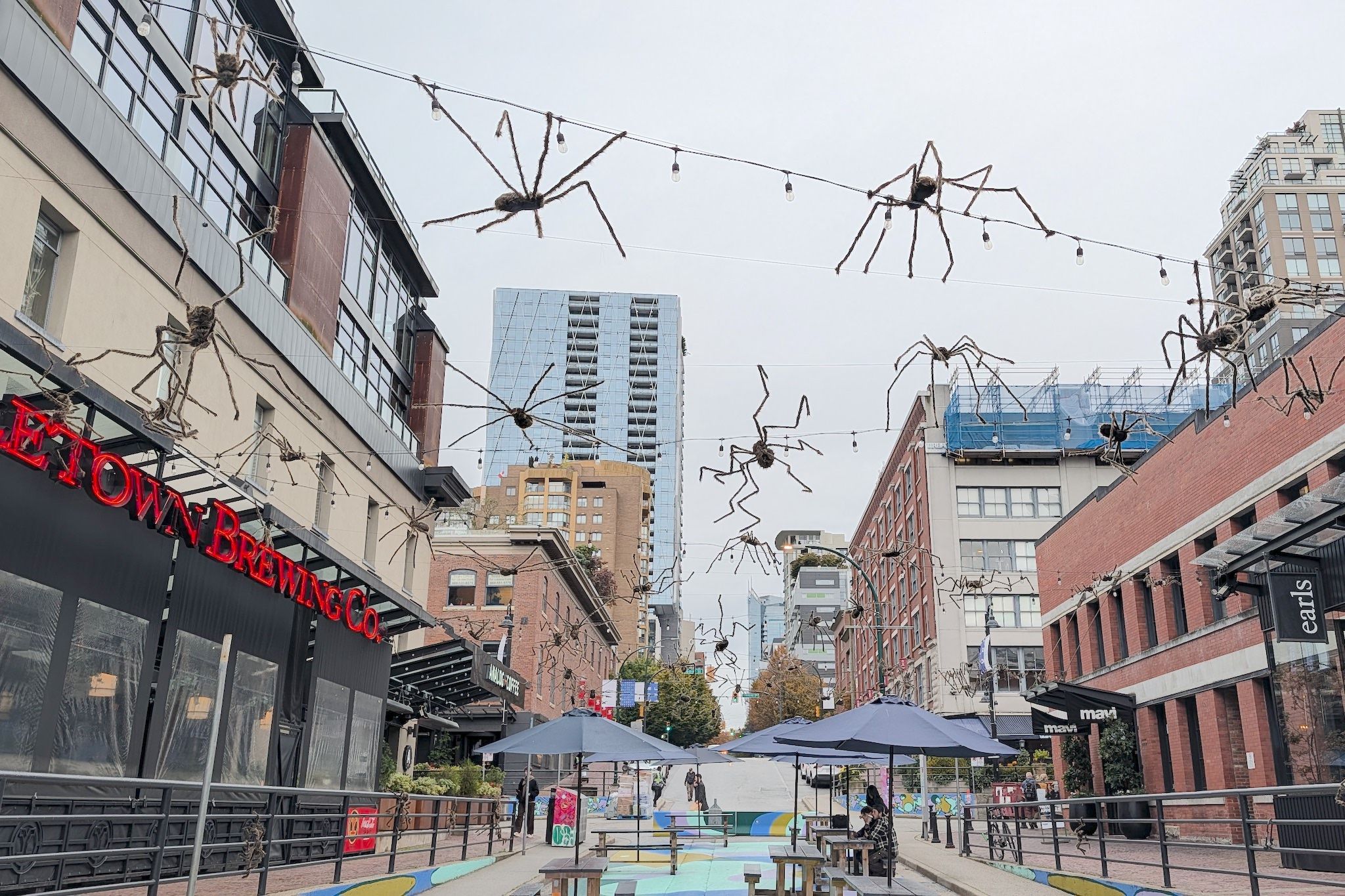 Giant hairy spider decorations appear at Helmcken Plaza in Yaletown ahead of Halloween