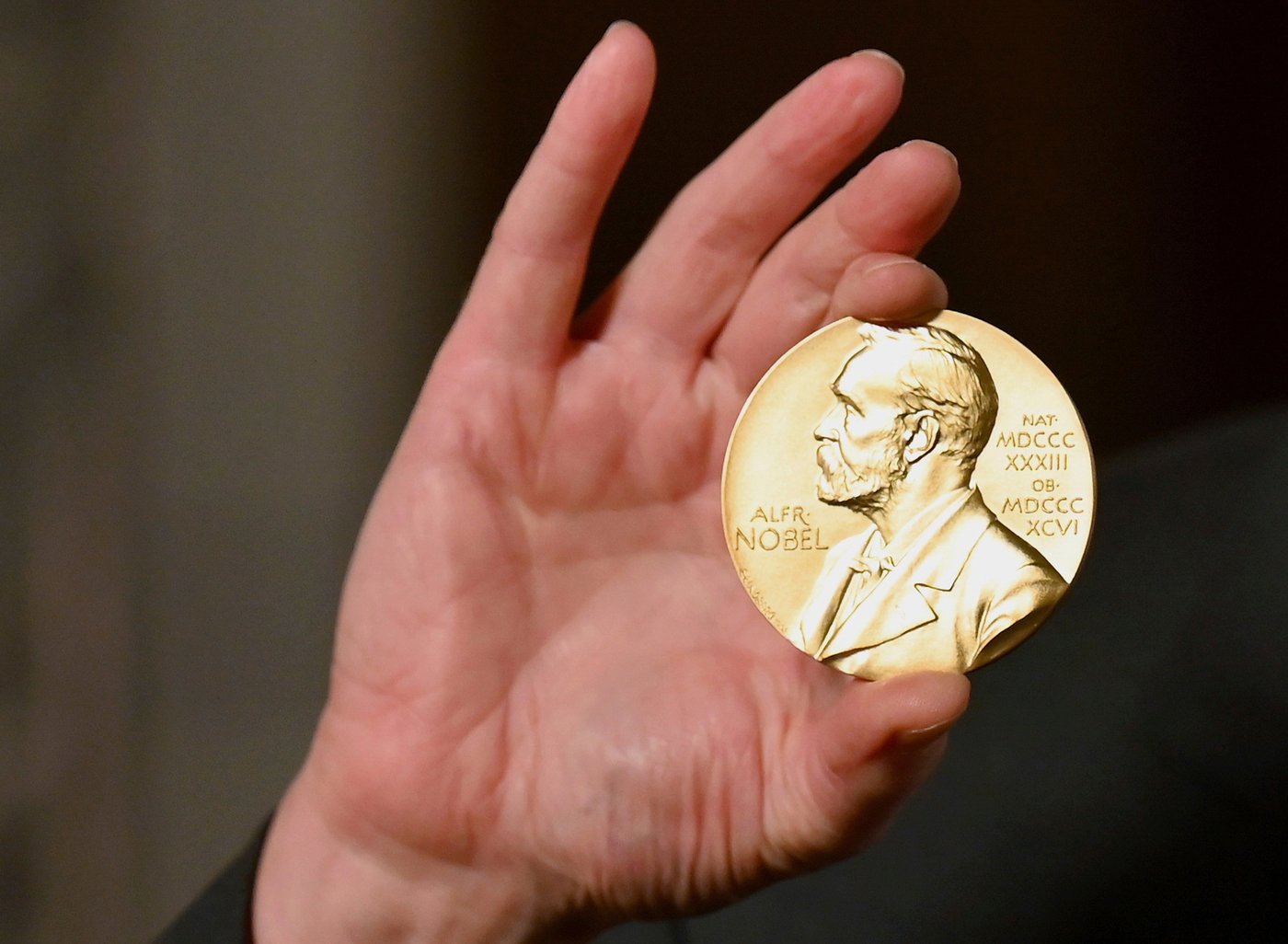 Two American economists win Nobel memorial prize in economics for models to manage economic shocks