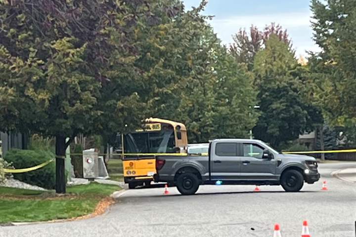 RCMP remind drivers to stop for school buses after two students struck near Kelowna