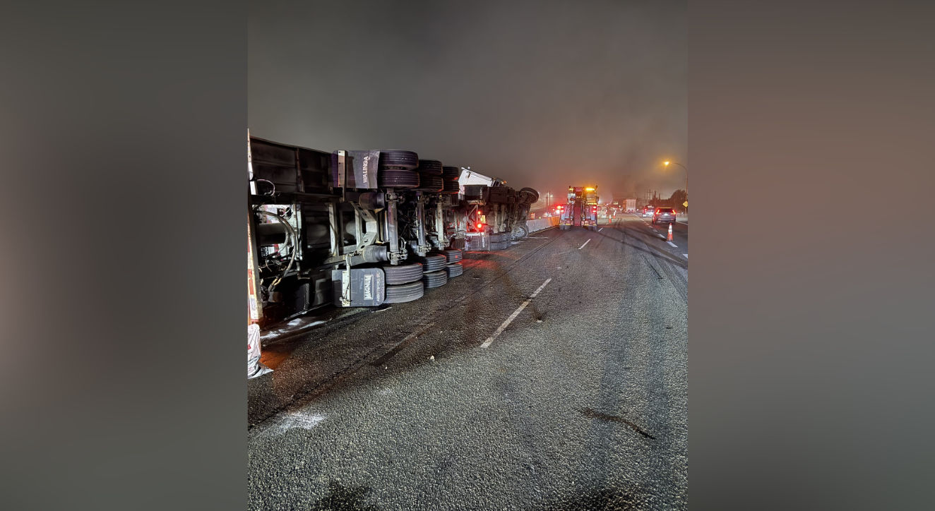 Grain-laden semi flips on Highway 1 near Sumas Way in Abbotsford; no injuries reported