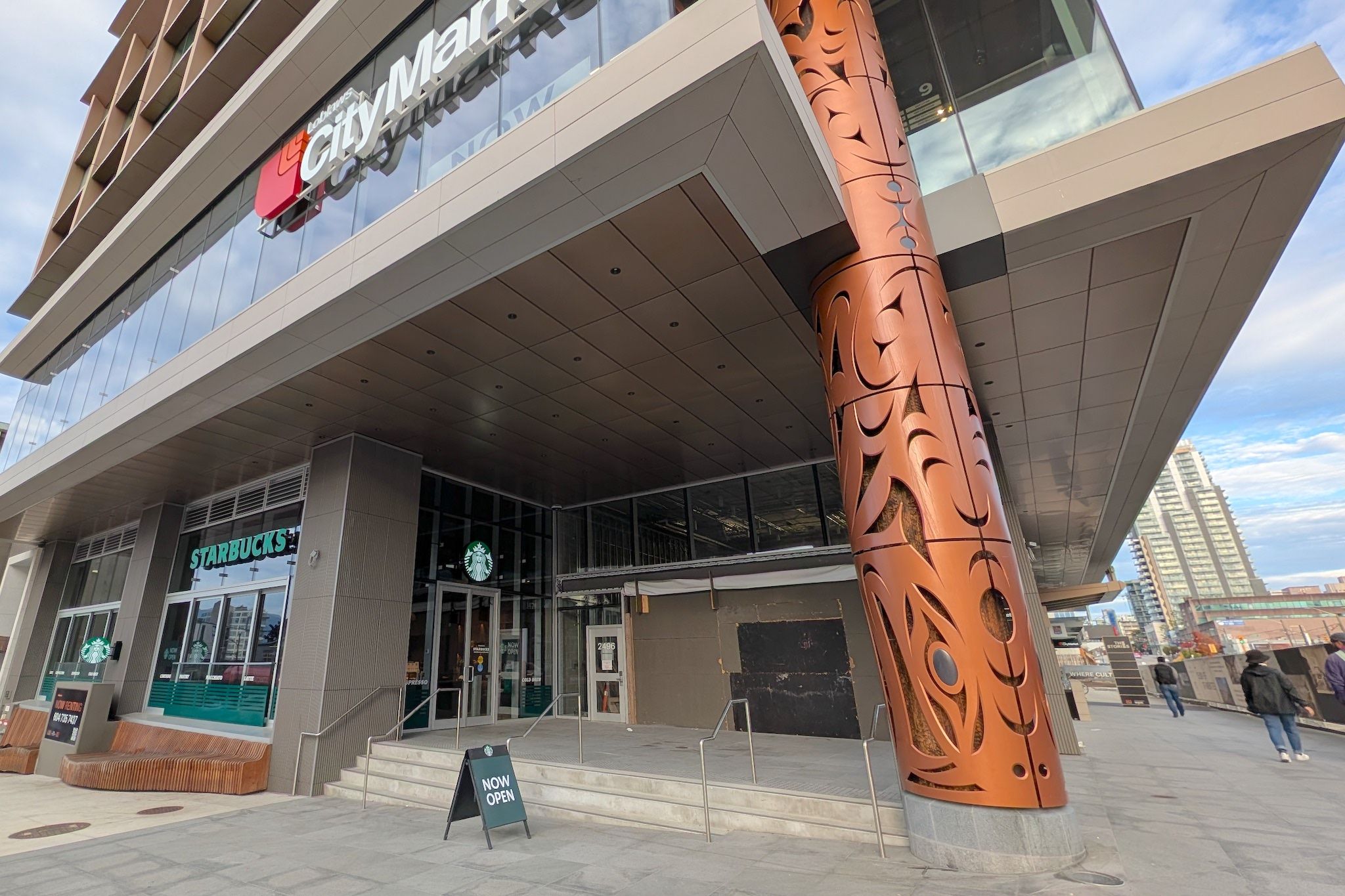 Starbucks opens in The Stories tower at West Broadway and Granville near future South Granville Station