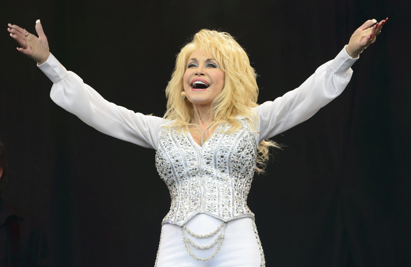 Dolly Parton Day on Sept. 25 brings pink lights, parades and book donations