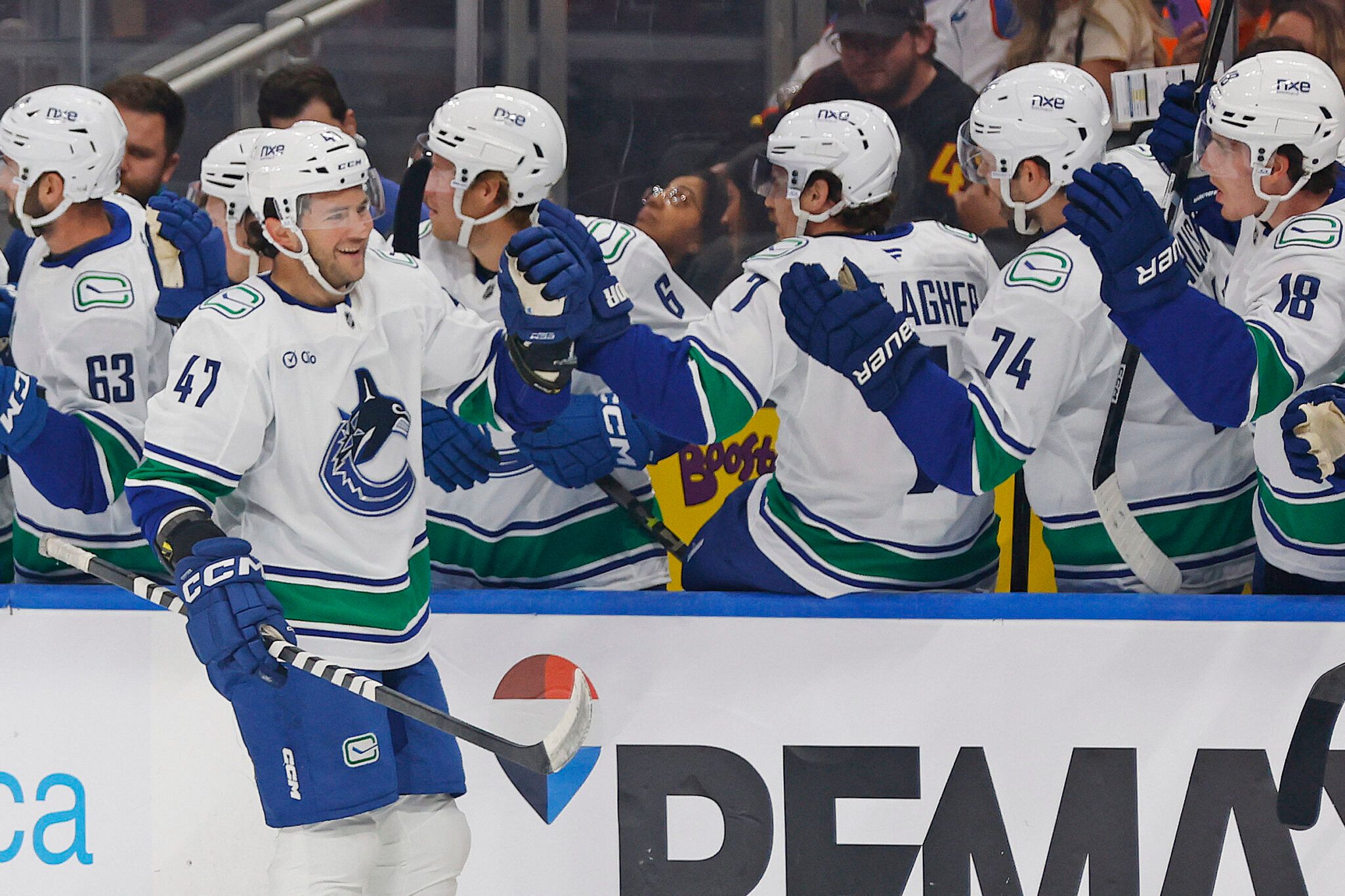 Canucks spoil Oilers’ home opener with an entertaining overtime win after scoring six