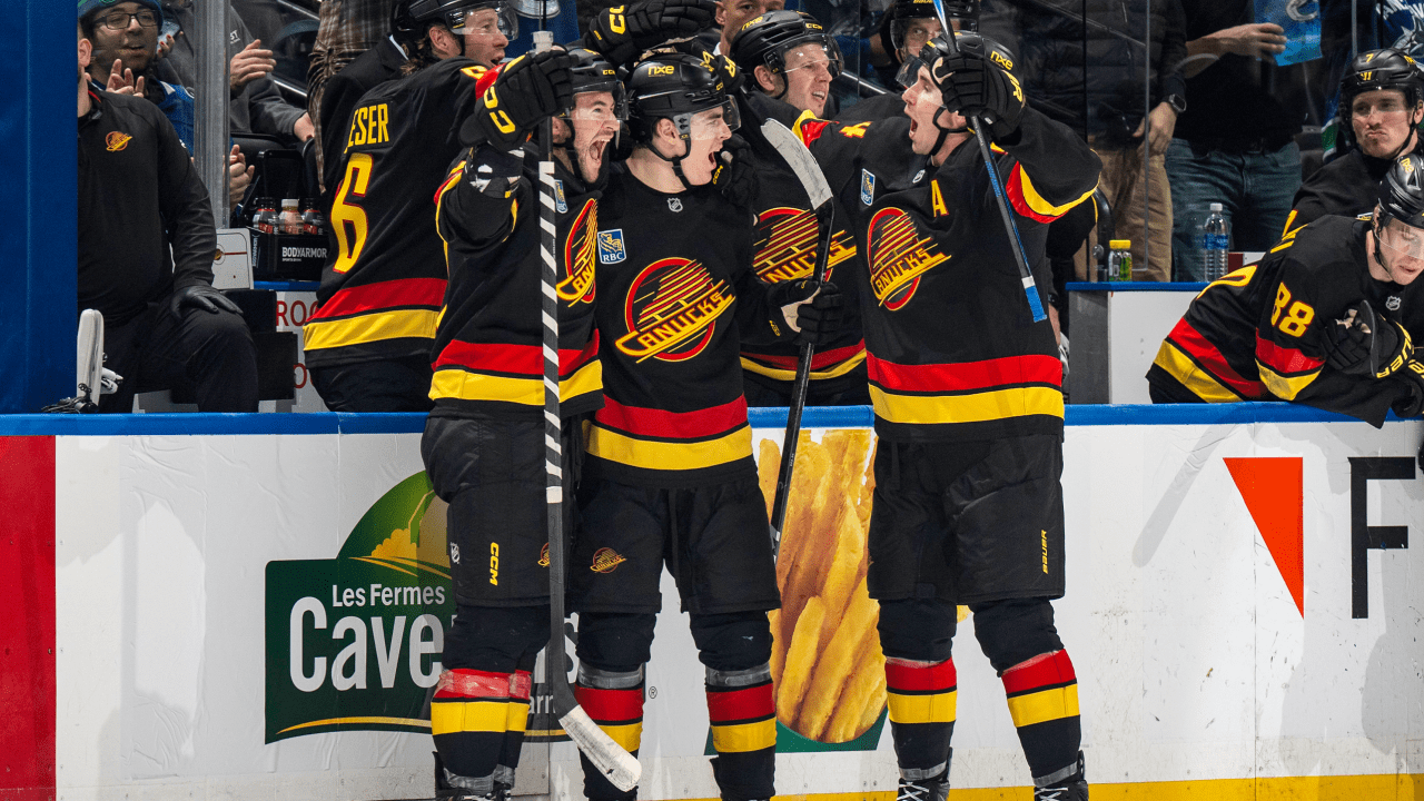 Canucks complete third-period rally, beat Flames 4-1 after scoring four in the final frame